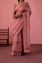 Peach organza embroidered saree comes with unstitched & unembroidered blouse fabric in chanderi