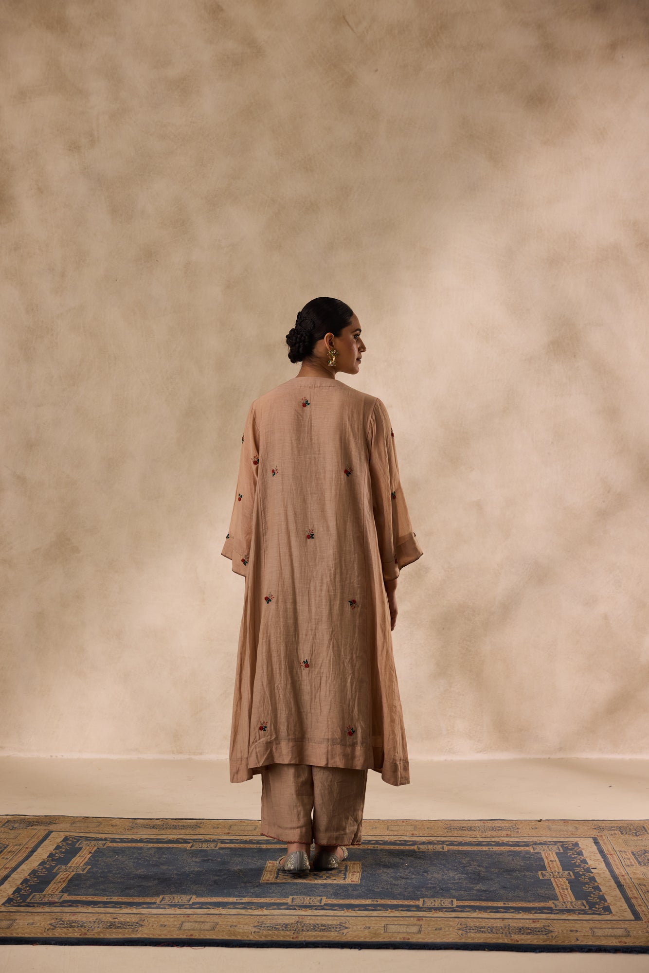 Champagne chanderi  embroidered kurta paired with organic cotton slip, pant & organza dupatta
