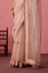 Cozy Peach organza buti embroidered saree comes with unstitched & unembroidered blouse fabric in chanderi