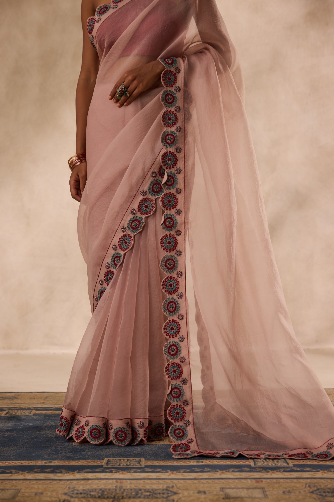 Rose gold organza heavy cutwork border embroidered saree comes with unstitched & unembroidered blouse fabric in chanderi