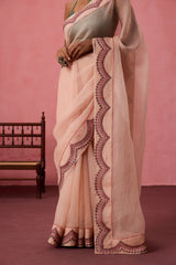 Cozy peach organza heavy scalloped border saree comes with unstitched & unembroidered blouse fabric in chanderi