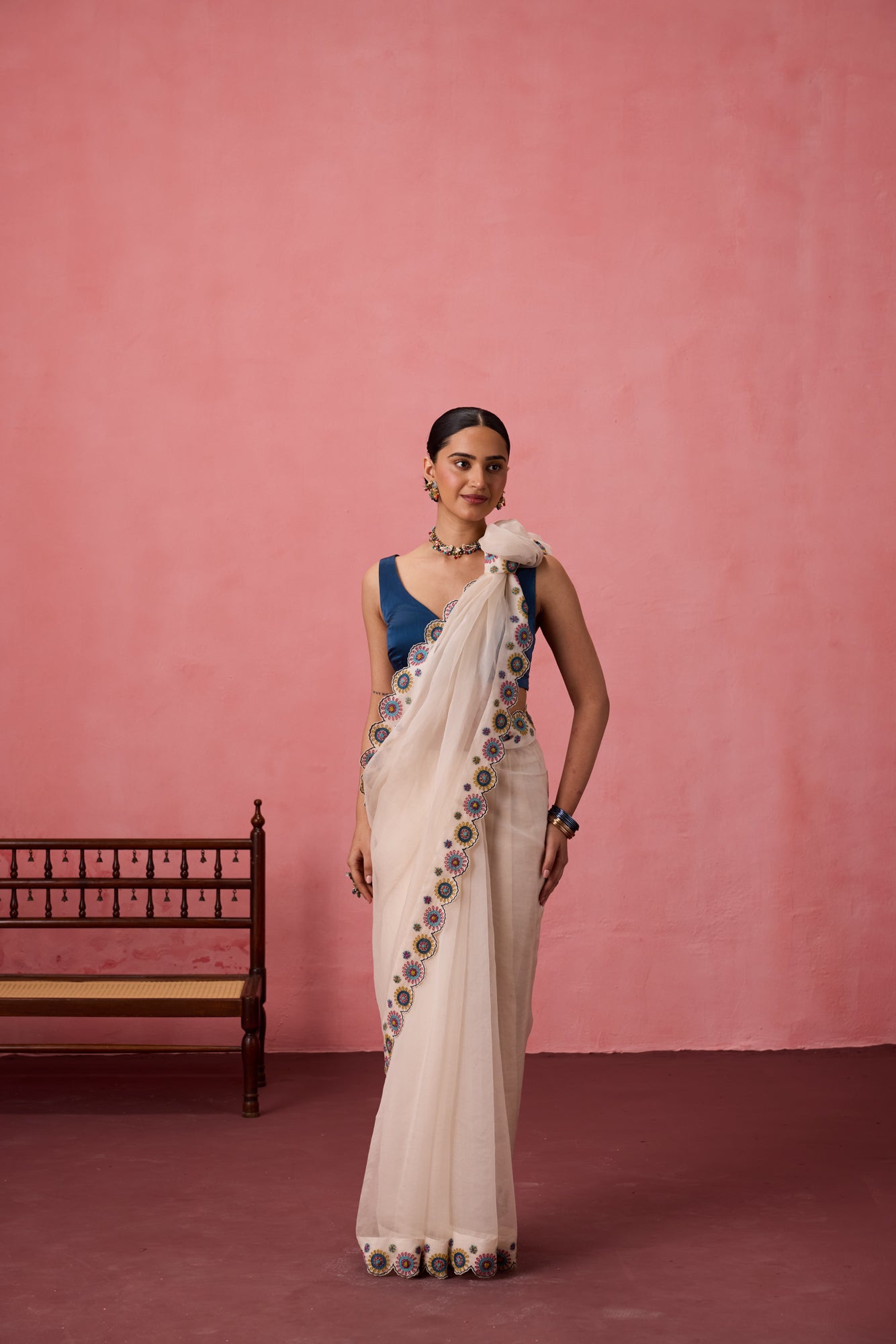 Ivory organza heavy scalloped cutwork embroidered saree comes with unstitched & unembroidered blouse fabric in chanderi