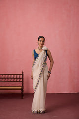 Ivory organza heavy scalloped cutwork embroidered saree comes with unstitched & unembroidered blouse fabric in chanderi