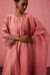 Peach chanderi embroidered kurta with embellished border on sleeves paired with an organic cotton slip pant & organza dupatta