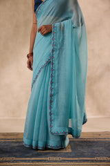 Sky blue chanderi scalloped embroidered saree comes with unstitched & unembroidered blouse fabric in chanderi