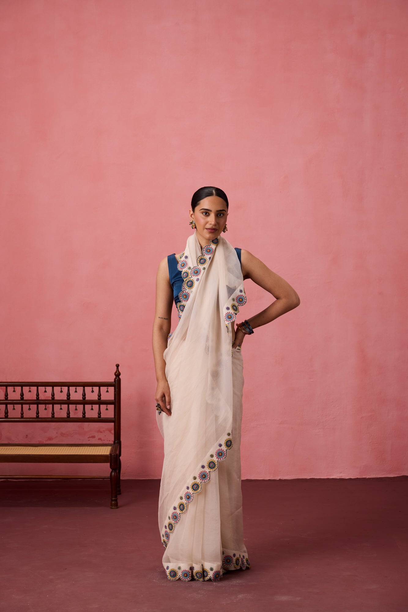 Ivory organza heavy scalloped cutwork embroidered saree comes with unstitched & unembroidered blouse fabric in chanderi