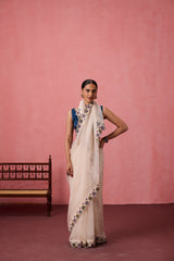 Ivory organza heavy scalloped cutwork embroidered saree comes with unstitched & unembroidered blouse fabric in chanderi