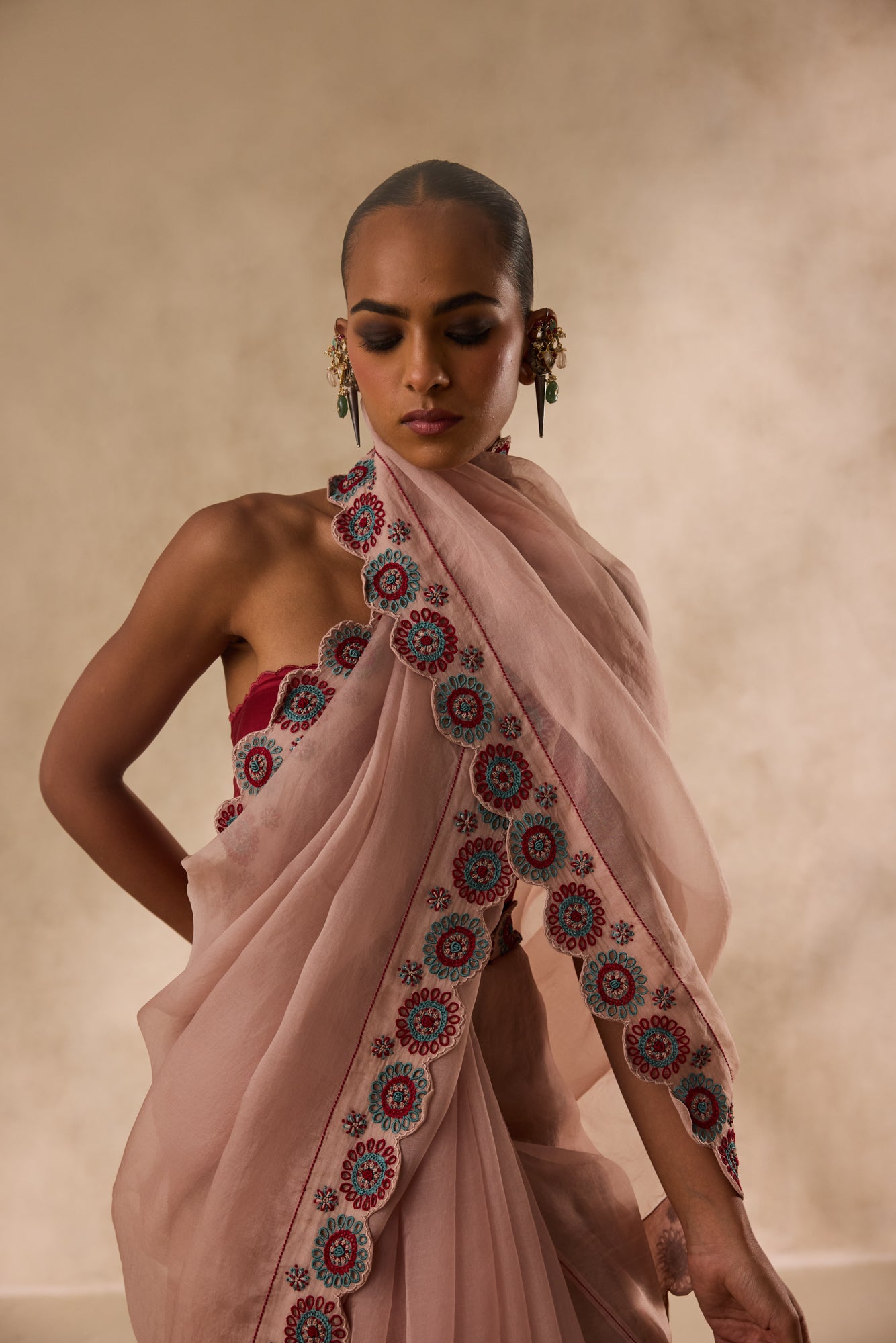 Rose gold organza heavy cutwork border embroidered saree comes with unstitched & unembroidered blouse fabric in chanderi