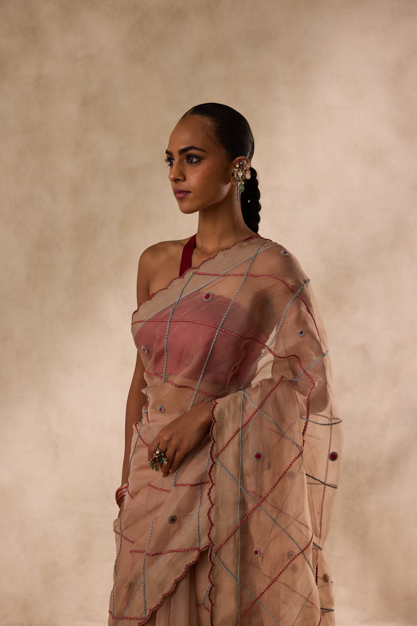 Beige organza jaal embroidered saree comes with unstitched & unembroidered blouse fabric in chanderi