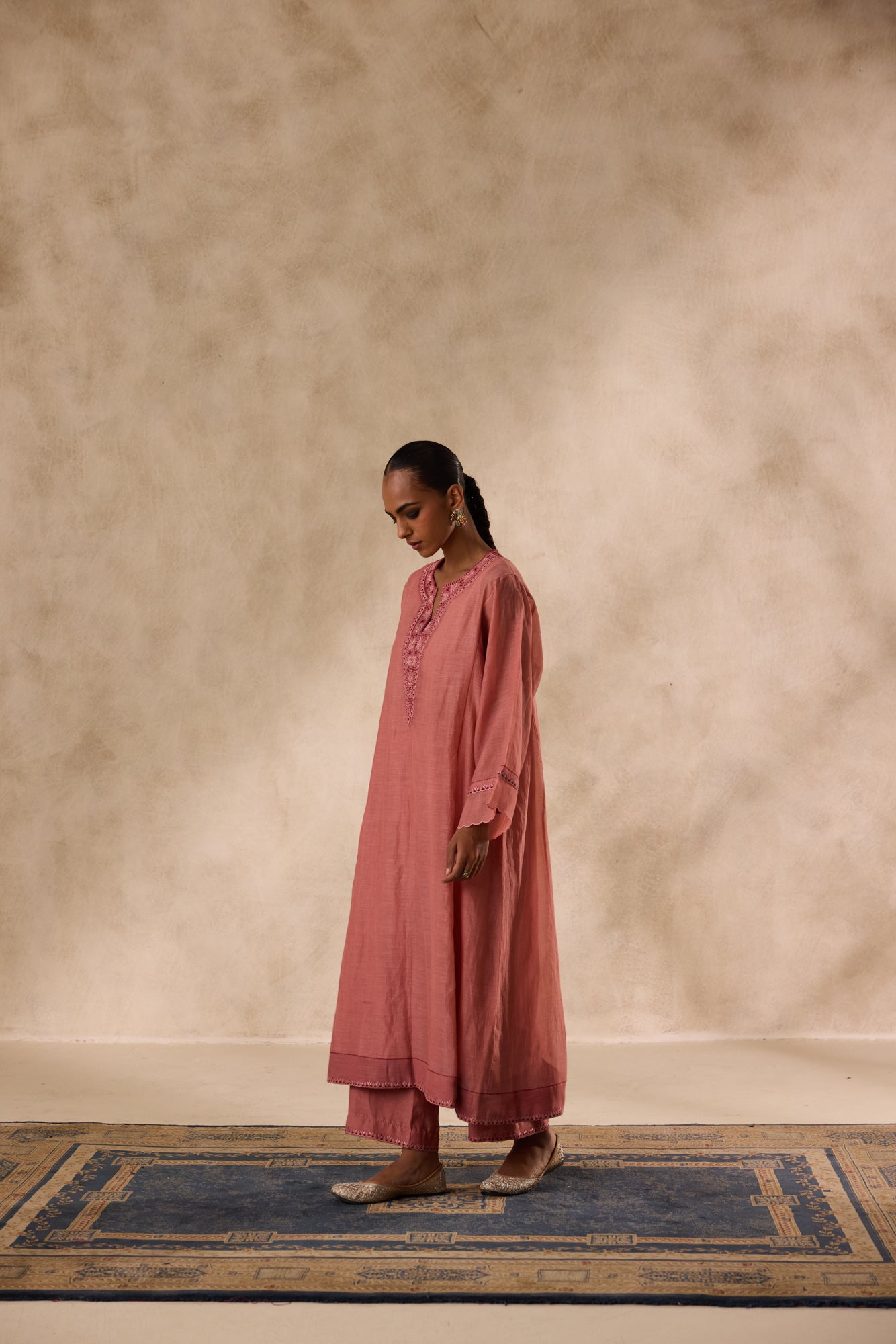 Peach chanderi heavy neckline resham embroidred kurta paired with organic cotton slip,pant & heavy border dupatta