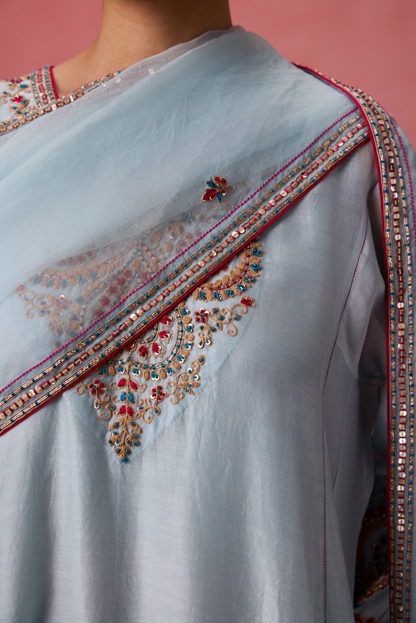 Sky blue chanderi dori work and french knot embroidered kurta paired with organic cotton slip, pant & organza dupatta