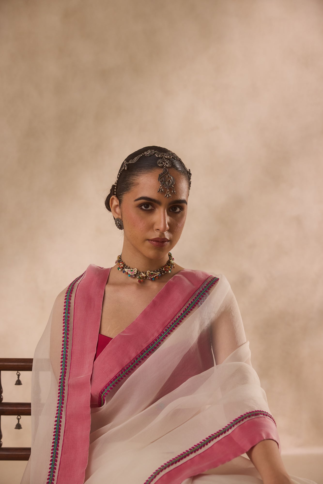 Ivory organza rasham buti embroidered saree comes with unstitched & unembroidered blouse fabric in chanderi