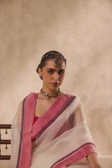 Ivory organza rasham buti embroidered saree comes with unstitched & unembroidered blouse fabric in chanderi