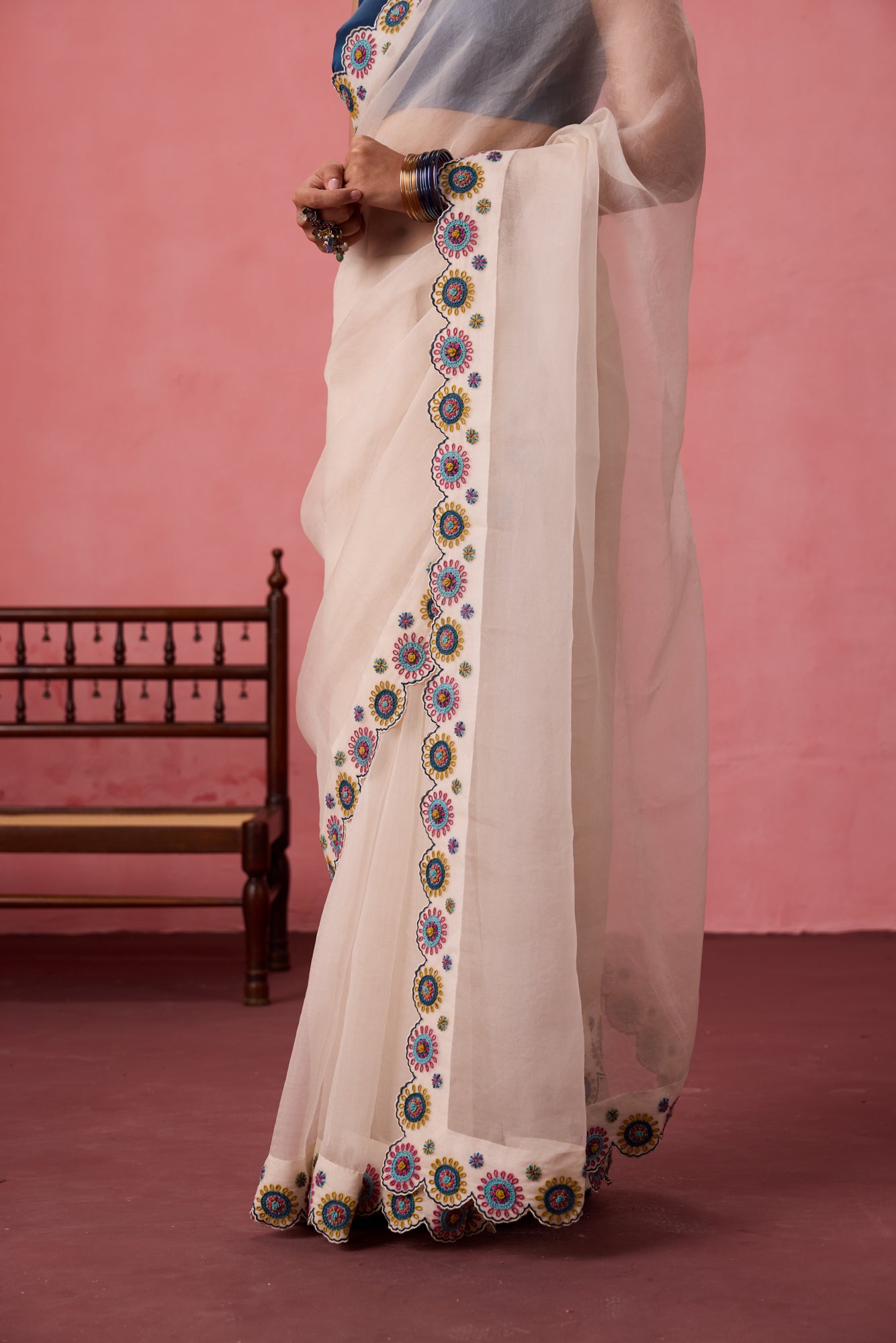 Ivory organza heavy scalloped cutwork embroidered saree comes with unstitched & unembroidered blouse fabric in chanderi