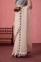 Ivory organza heavy scalloped cutwork embroidered saree comes with unstitched & unembroidered blouse fabric in chanderi