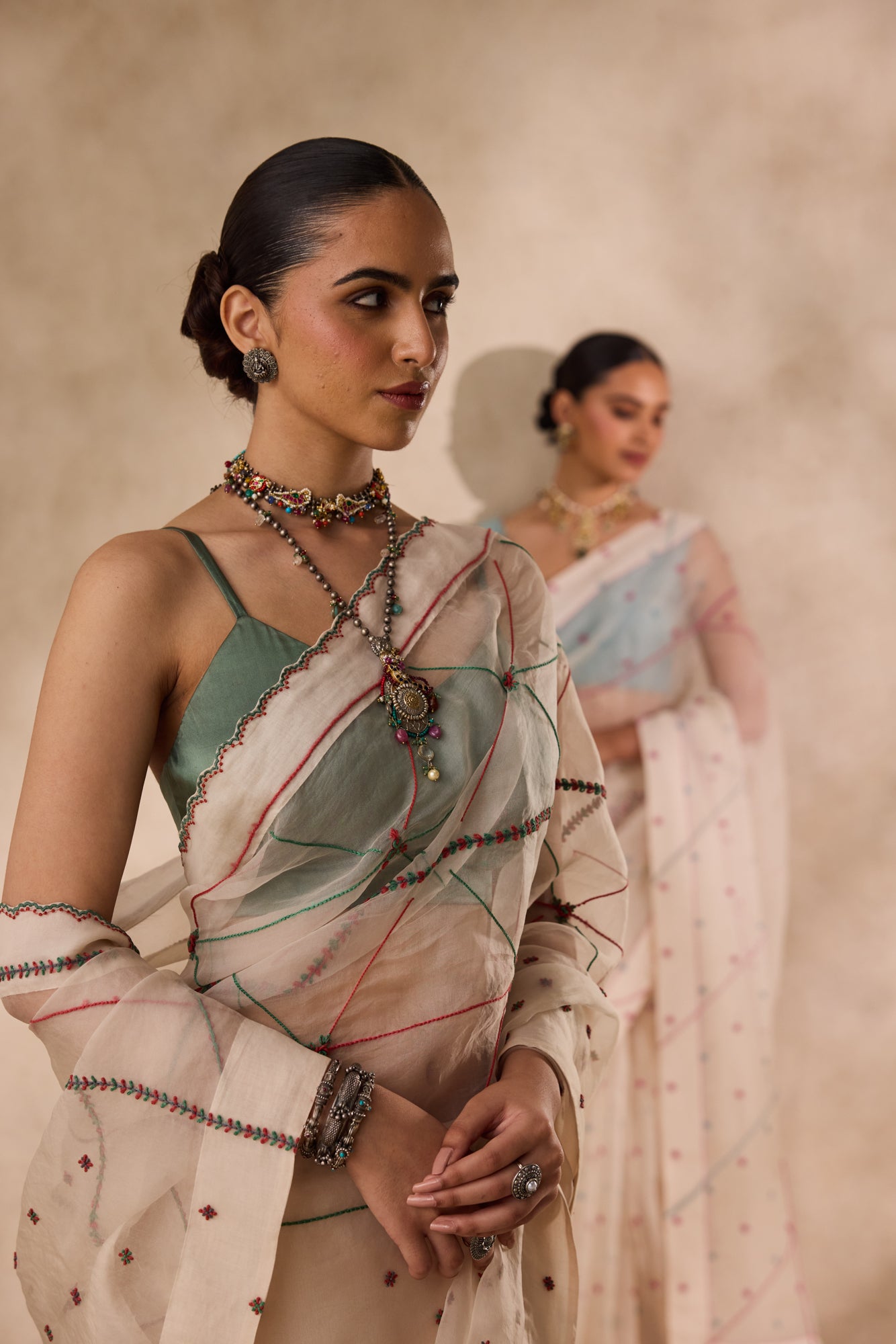 Ivory organza resham and thread embroidered saree comes with unstitched & unembroidered blouse fabric in chanderi