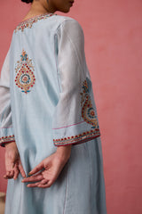 Sky blue chanderi dori work and french knot embroidered kurta paired with organic cotton slip, pant & organza dupatta