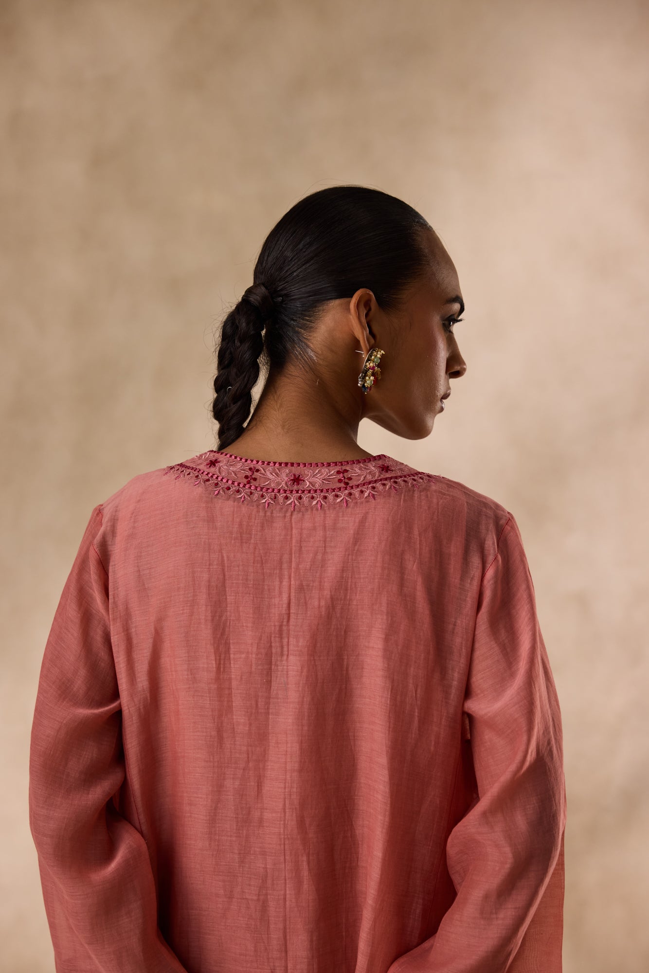 Peach chanderi heavy neckline resham embroidred kurta paired with organic cotton slip,pant & heavy border dupatta