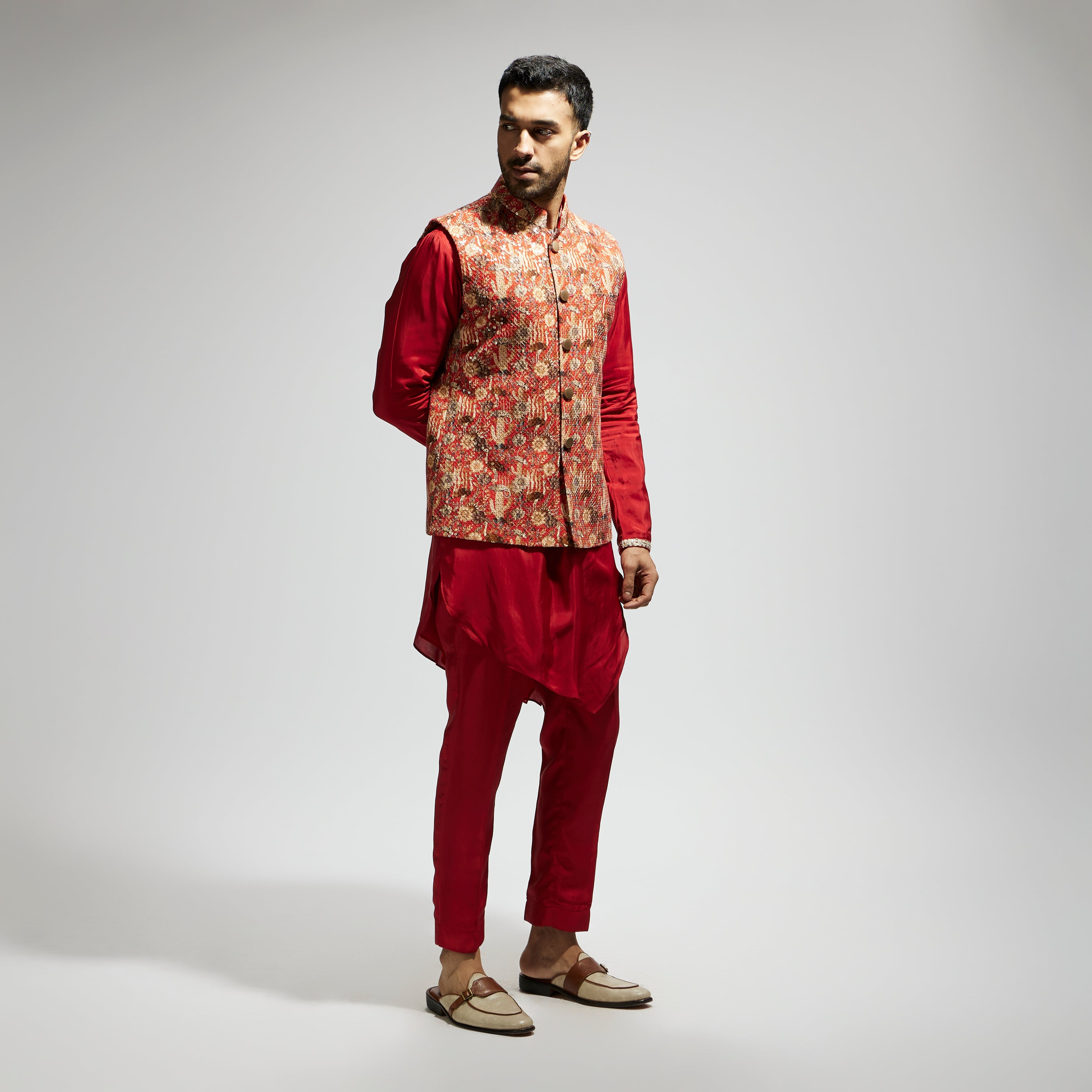 ORANGE JAAL EMBELLISHED BUNDI PAIRED WITH ORANGE DRAPE KURTA AND PANTS