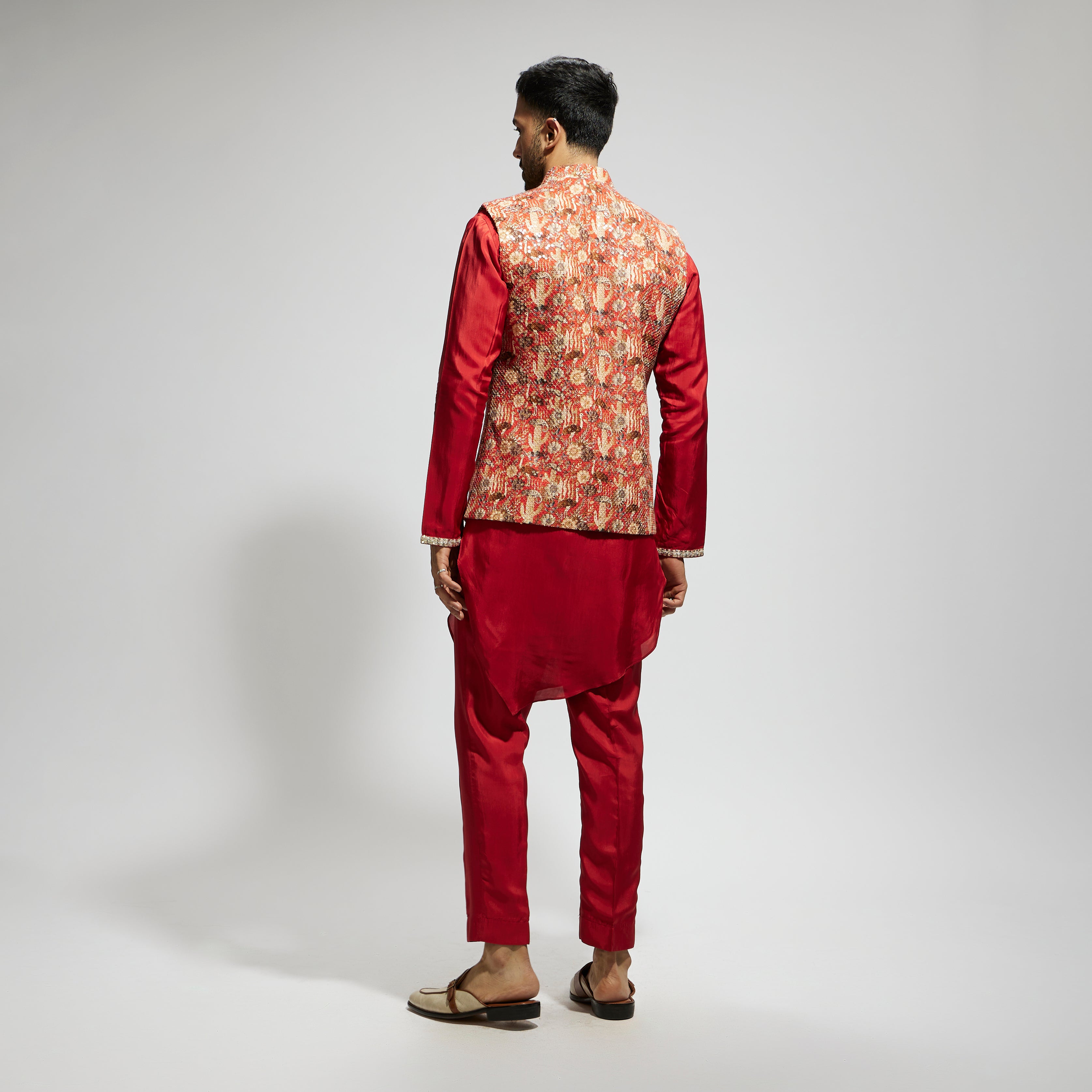 ORANGE JAAL EMBELLISHED BUNDI PAIRED WITH ORANGE DRAPE KURTA AND PANTS
