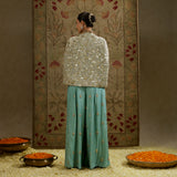 Metallic Cape Jacket with Bustier and Pleated Pants