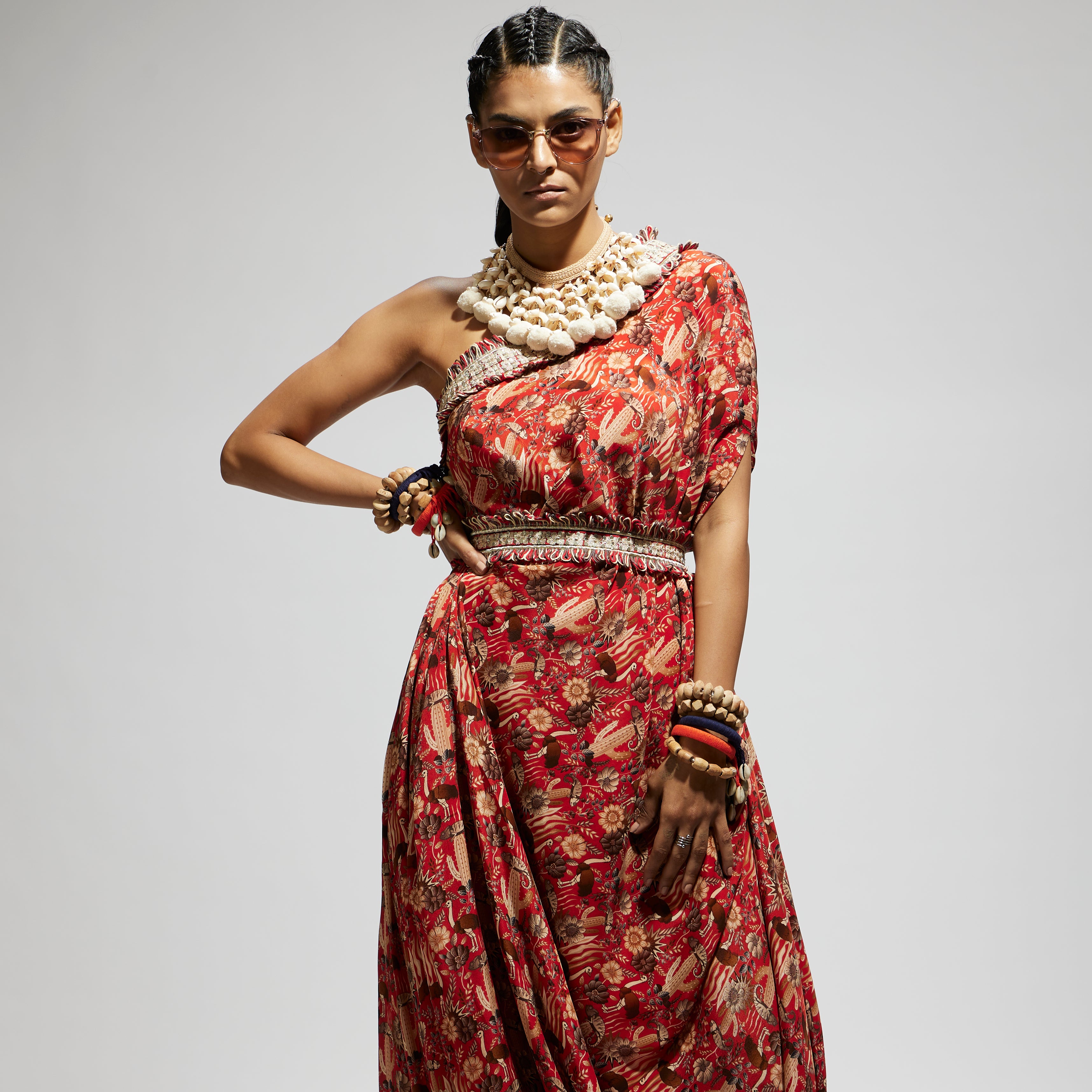 ORANGE JAAL PRINT ONE SHOULDER COWL DRESS TEAMED WITH A BELT