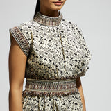 WHITE PRINT COWL DRESS TEAMED WITH A BELT