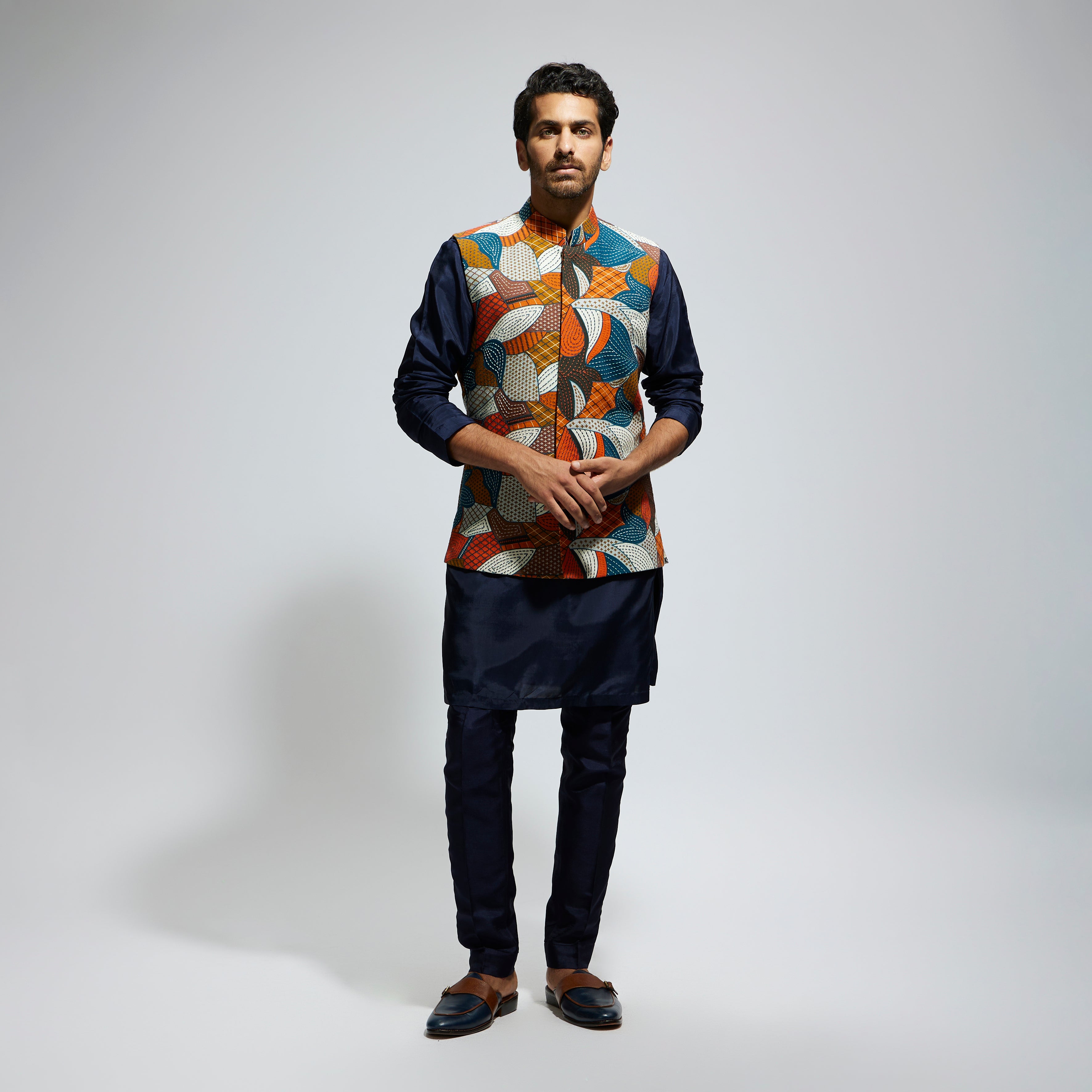 ABSTRACT BUNDI PAIRED WITH SOLID BLUE KURTA AND PANTS
