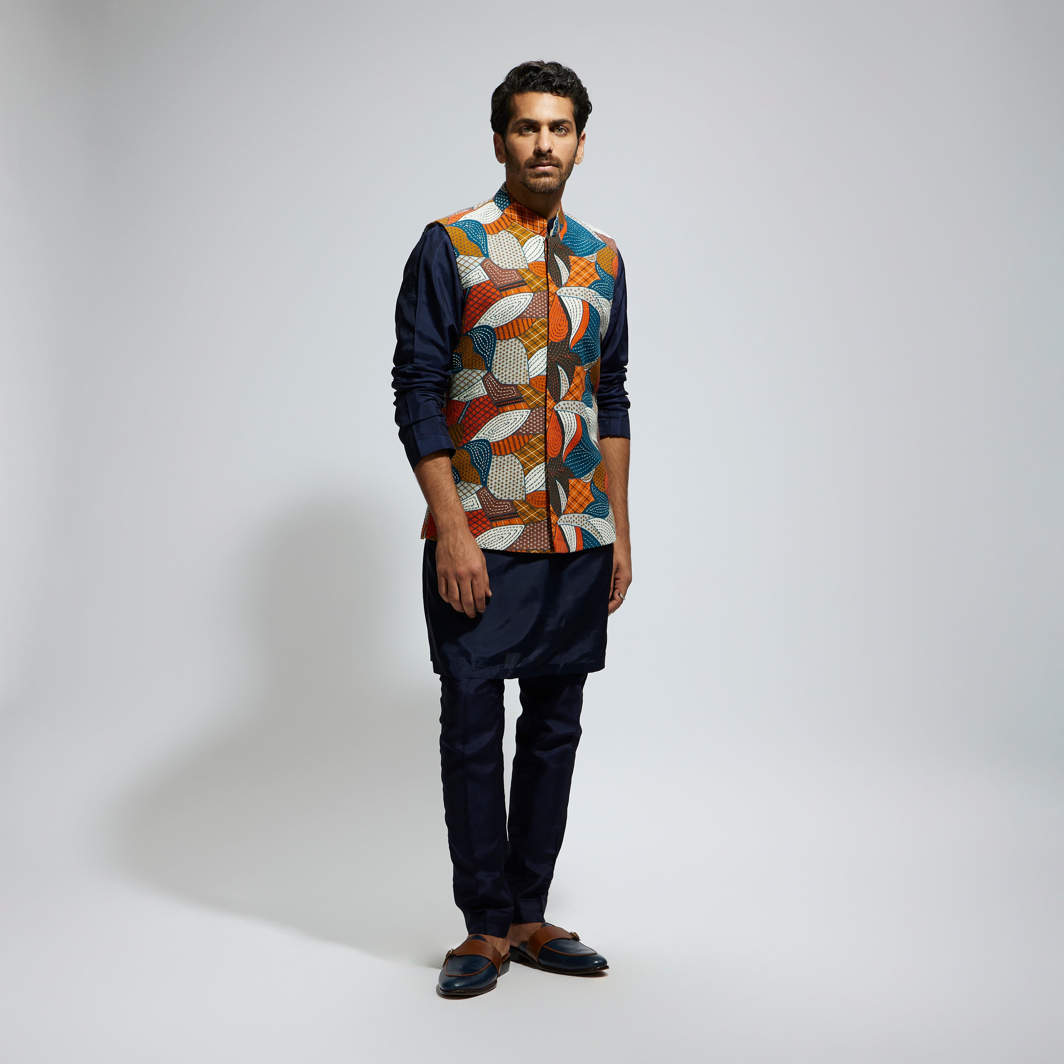 ABSTRACT BUNDI PAIRED WITH SOLID BLUE KURTA AND PANTS
