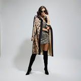 MASK AND FEATHER PRINT TRENCH COAT