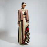 METALLIC EMBELLISHED CAPE JACKET PAIRED WITH STRIPE BUSTIER AND STRIPE DRAPE SKIRT