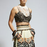 IVORY MASK PRINTED BOX PLEATED SKIRT WITH POCKETS TEAMED WITH A TEXTURED BUSTIER