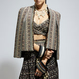 BROWN THREADWORK CAPE JACKET PAIRED WITH TEXTURED BUSTIER AND FLARED PANTS