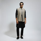 IVORY THREADWORK EMBELLISHED BUNDI
PAIRED WITH KURTA AND PANTS
