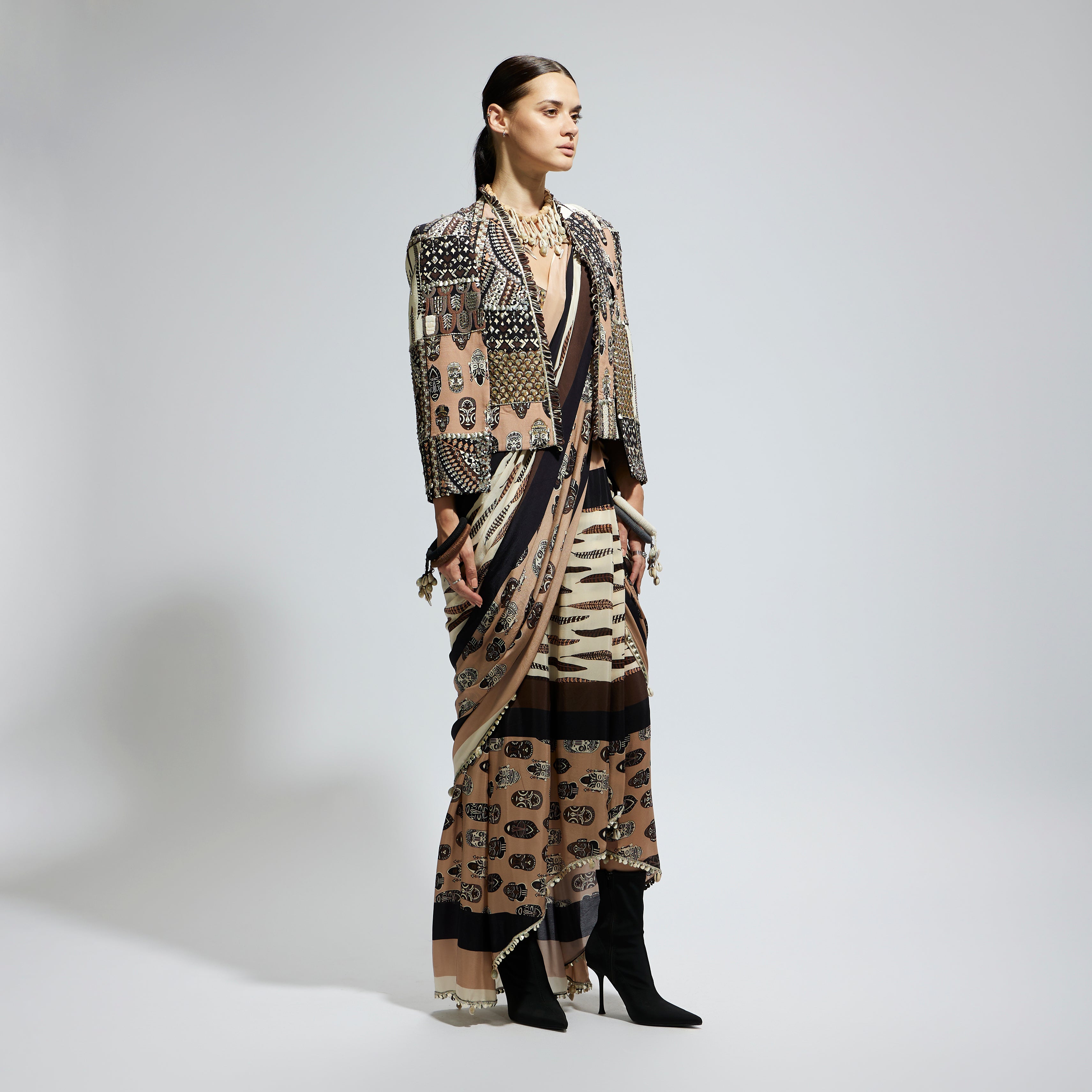 MASK AND FEATHER PRINT CASCADE SAREE PAIRED WITH METALLIC SCALLOP BUSTIER