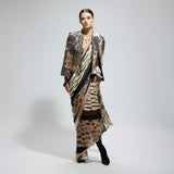 MASK AND FEATHER PRINT CASCADE SAREE PAIRED WITH METALLIC SCALLOP BUSTIER WITH PATCHWORK CAPE JACKET