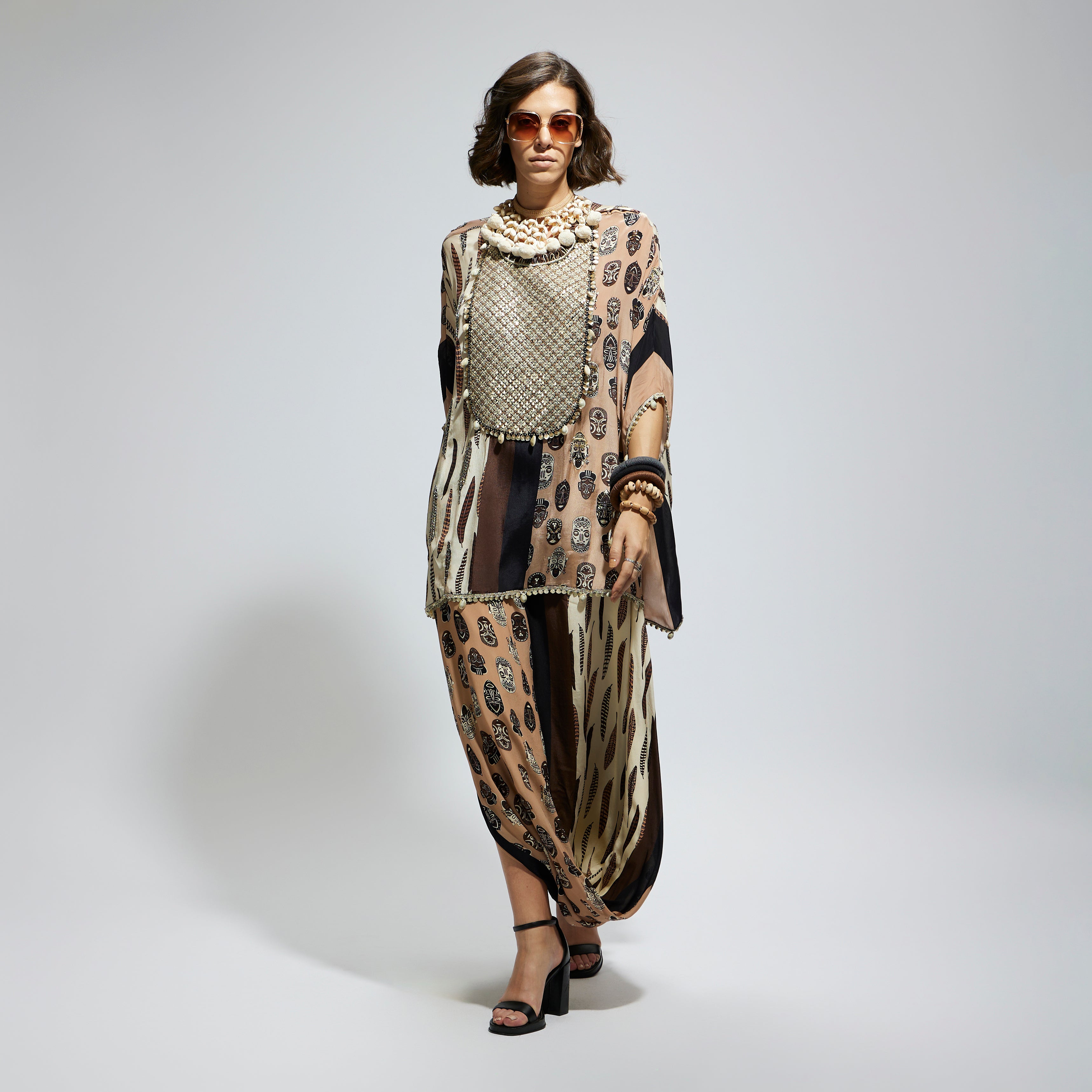 MASK AND FEATHER METALLIC EMBROIDERED YOKE SHORT KAFTAN PAIRED WTH DRAPE SKIRT