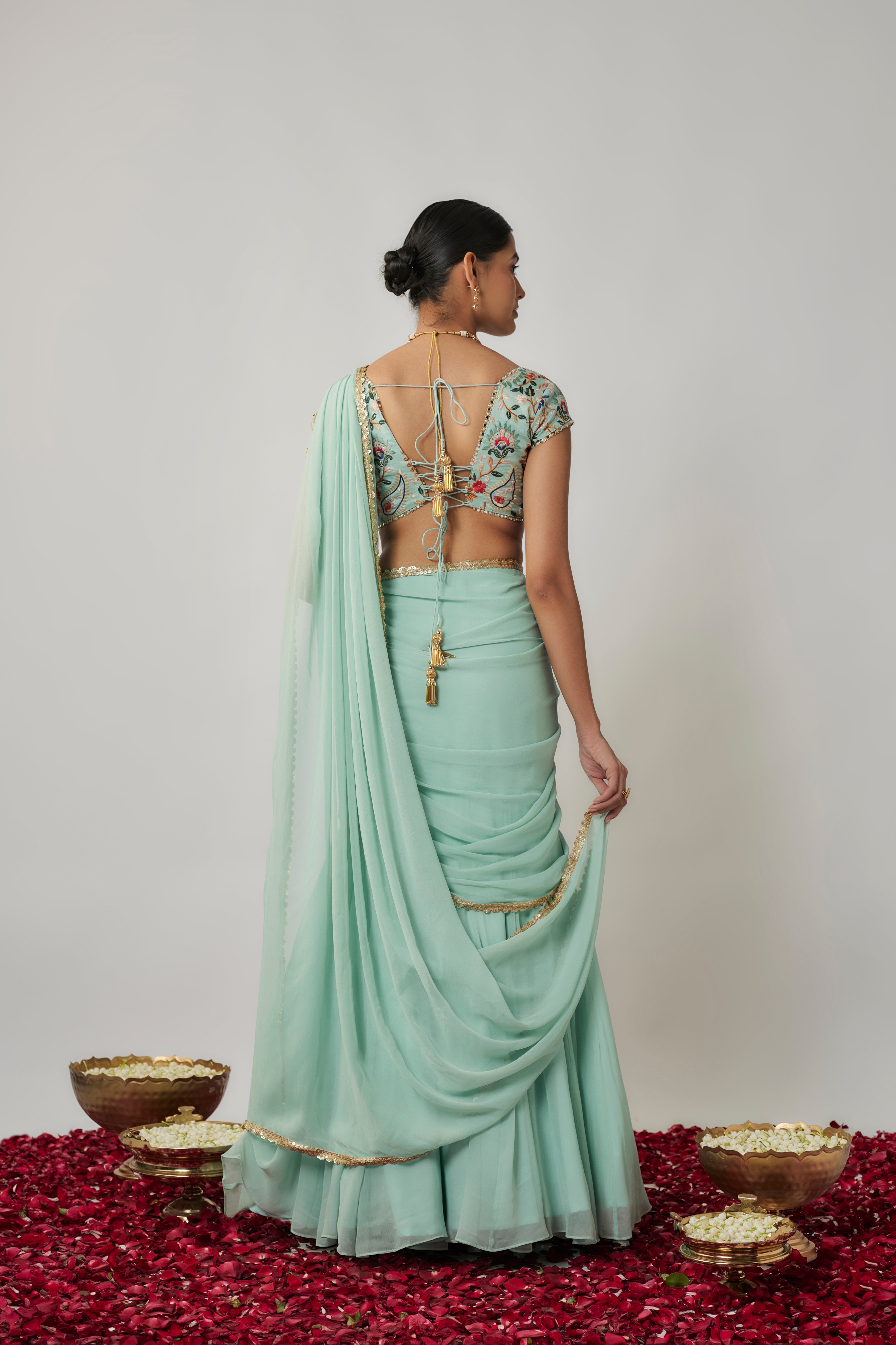 Mint and multicoloured thread embroidered pre-stitched georgette lehenga saree set