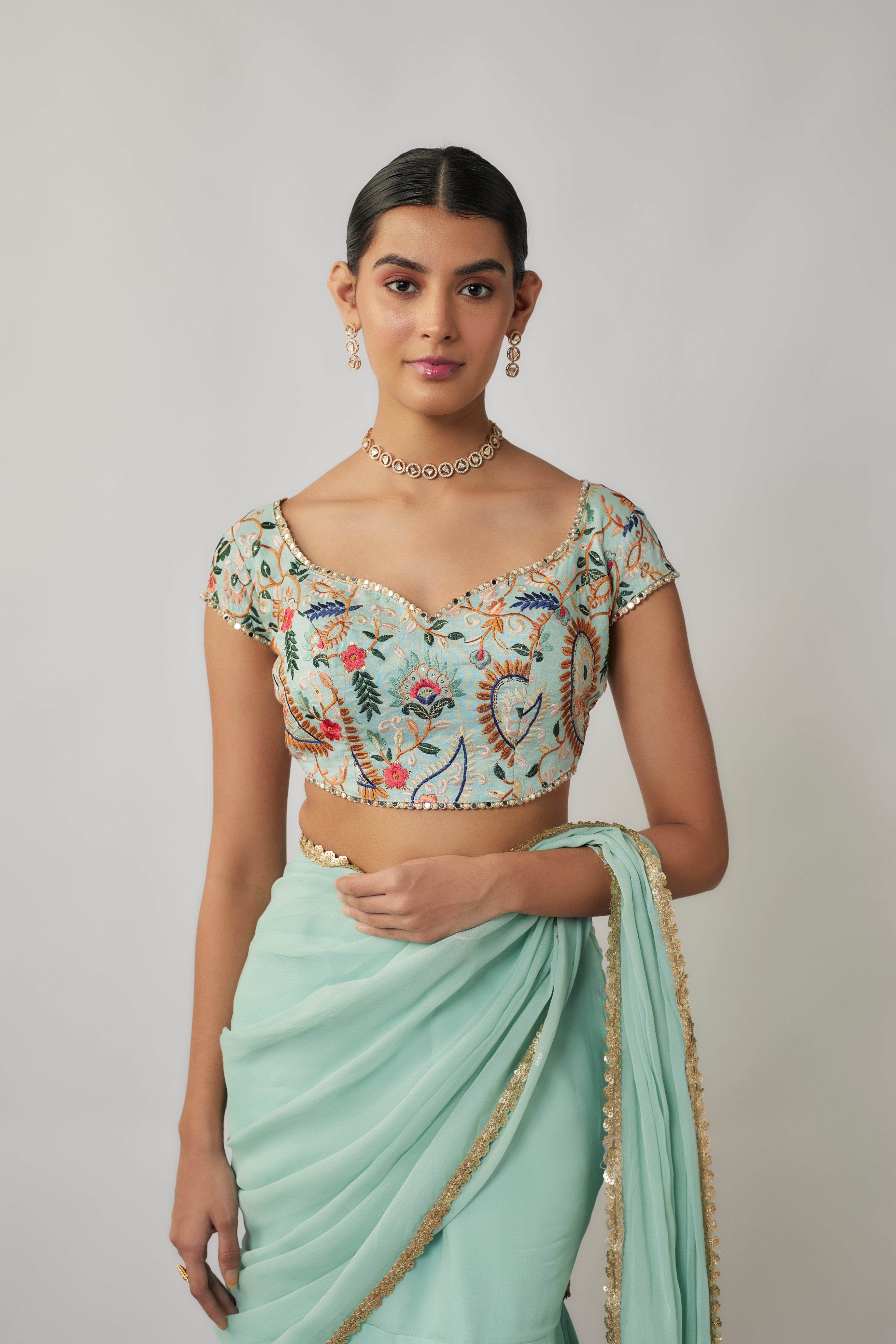 Mint and multicoloured thread embroidered pre-stitched georgette lehenga saree set