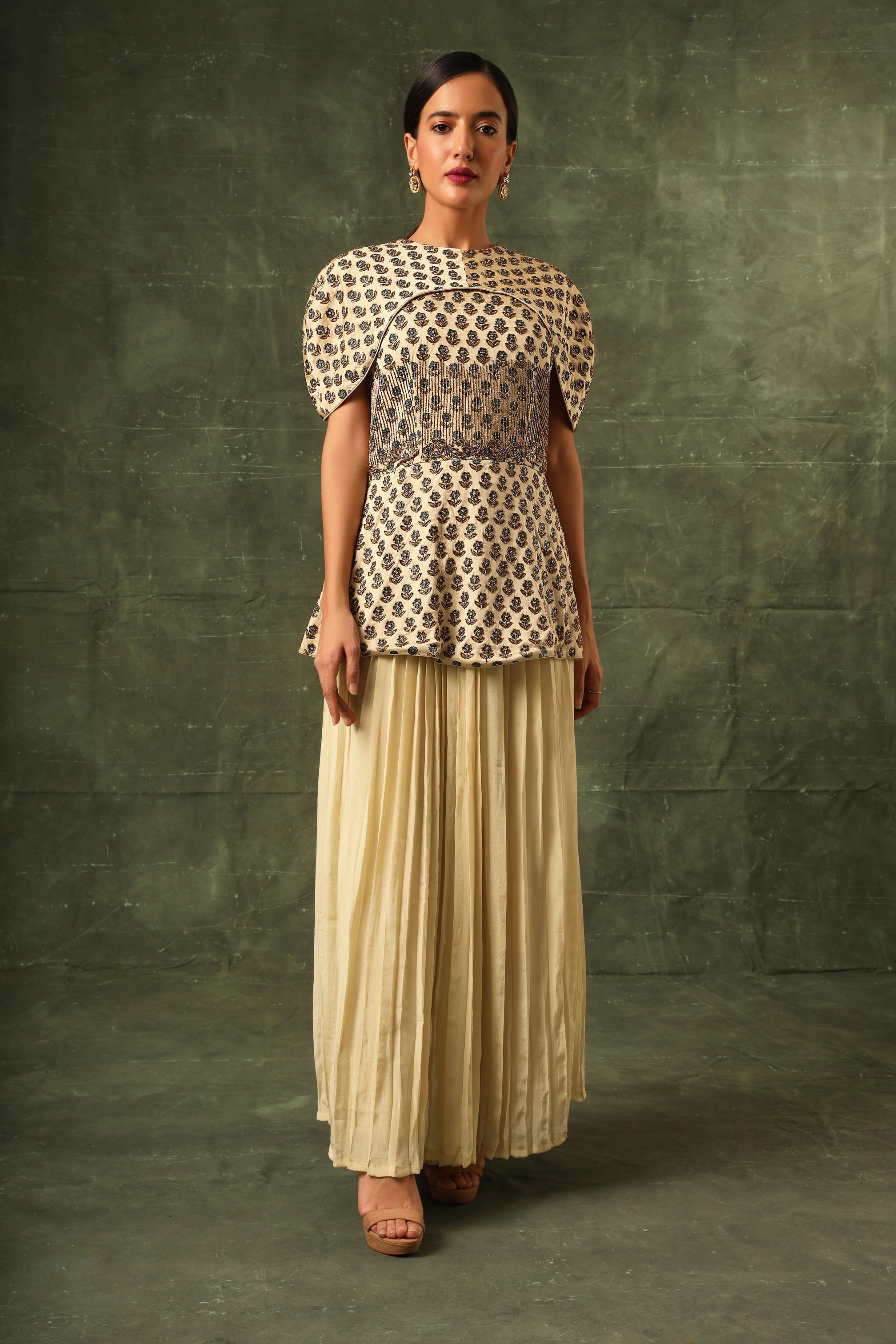 beige Ajrakh Peplum top with pleated pants