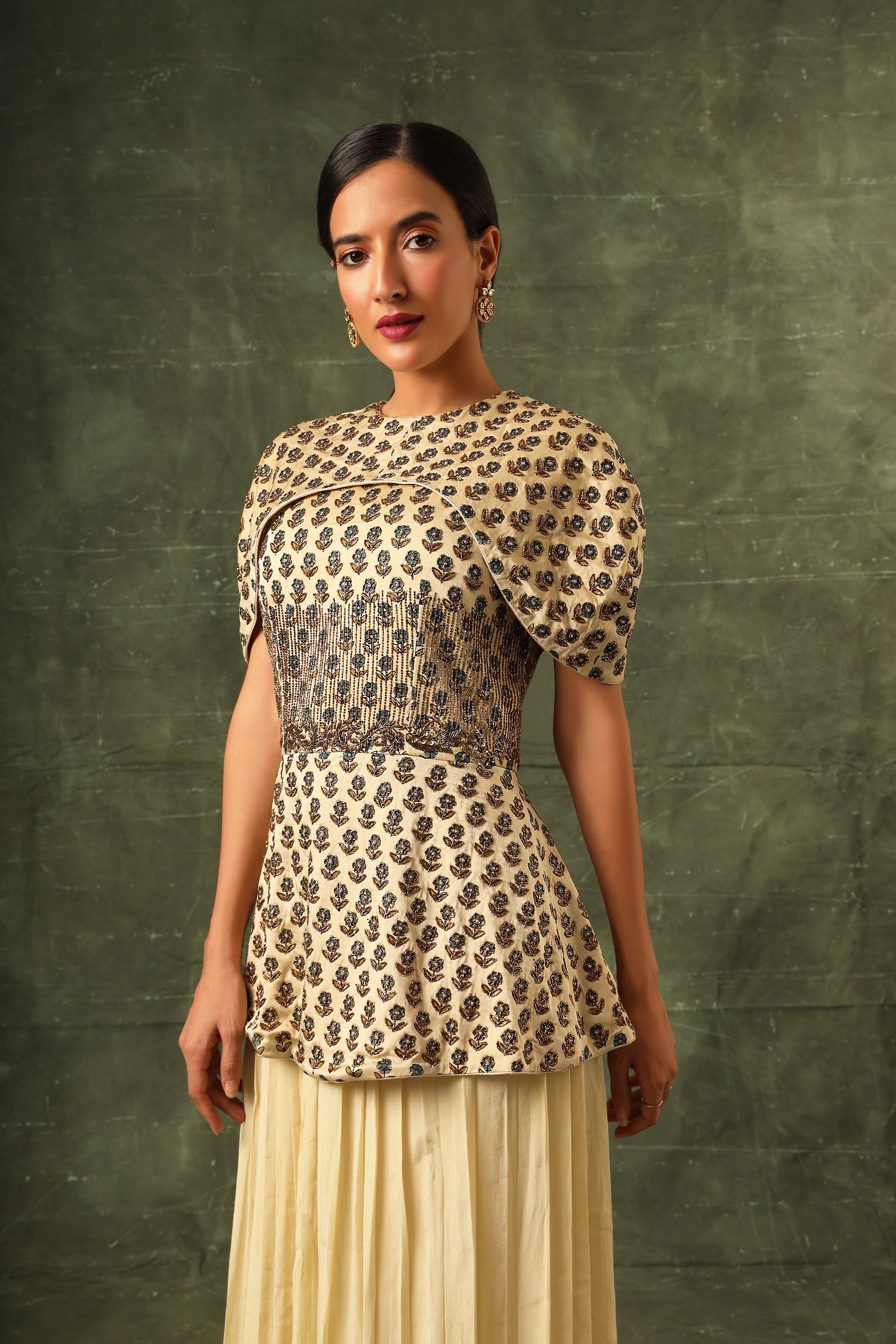 beige Ajrakh Peplum top with pleated pants