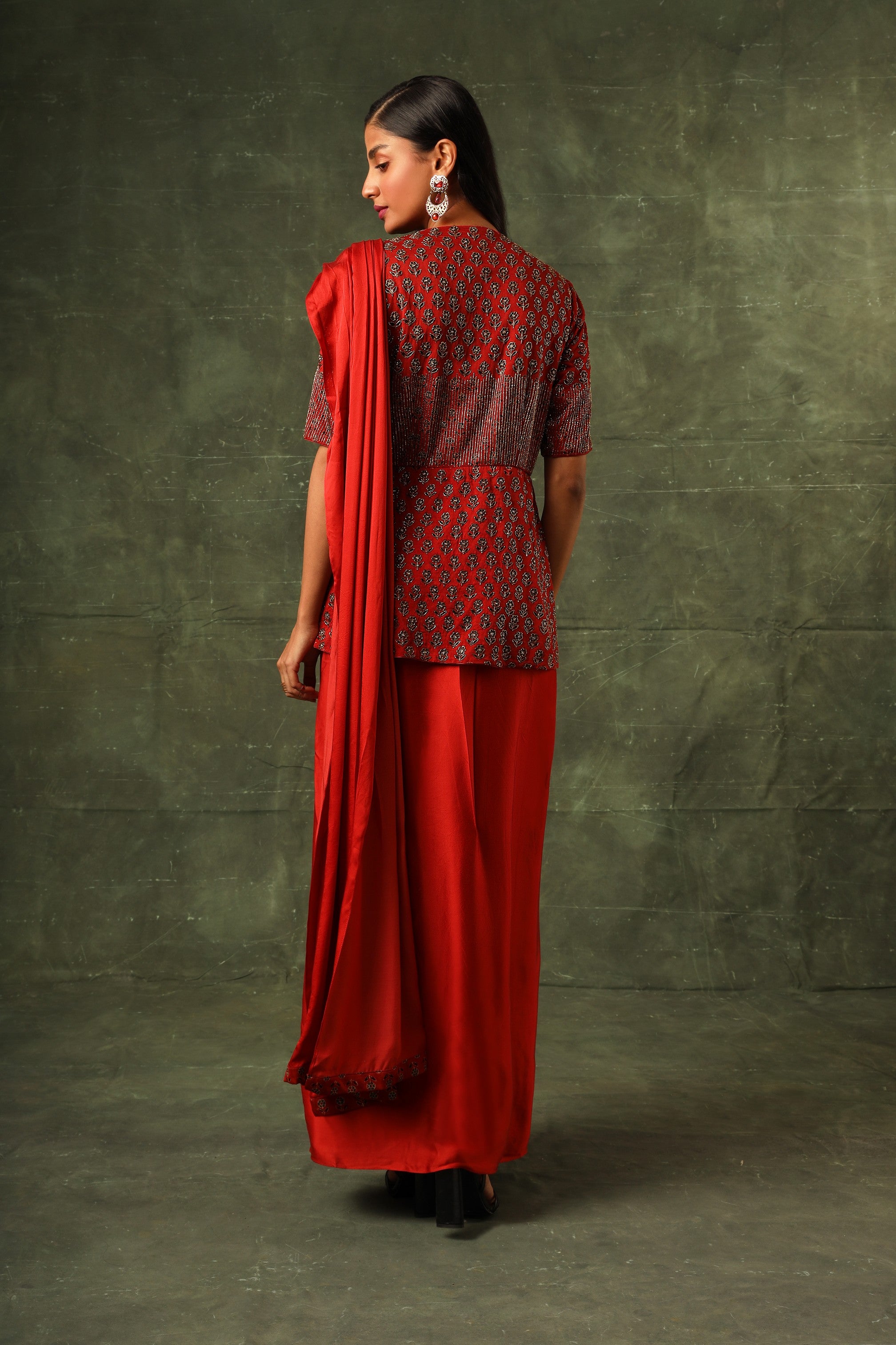 Red embellished ajrakh gown saree