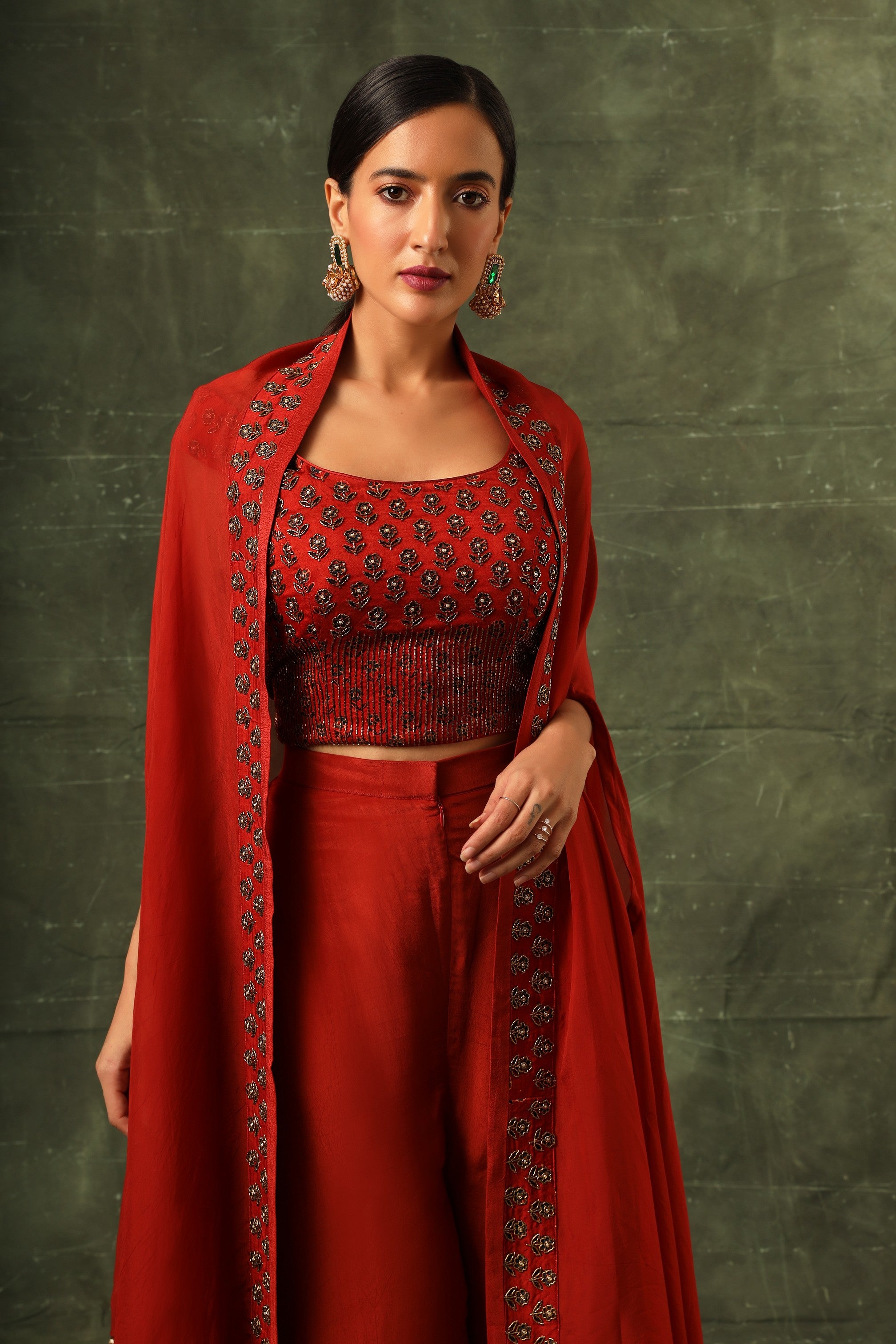 Red Ajrakh blouse and double layered flare pants with cape dupatta