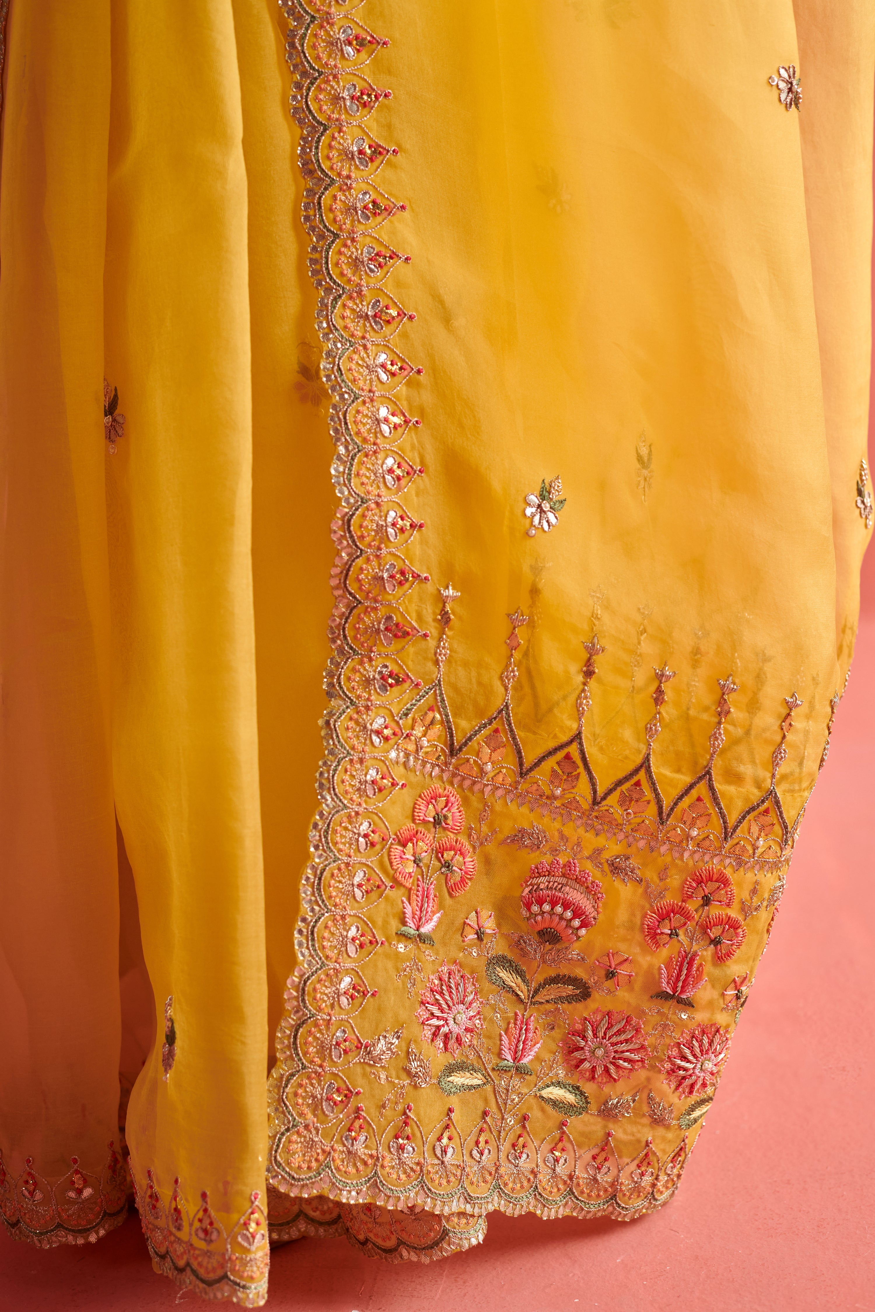 Yellow hand embrodiered saree with Mashru silk blouse