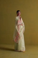 Sage green hand embrodiered saree with raw silk blouse