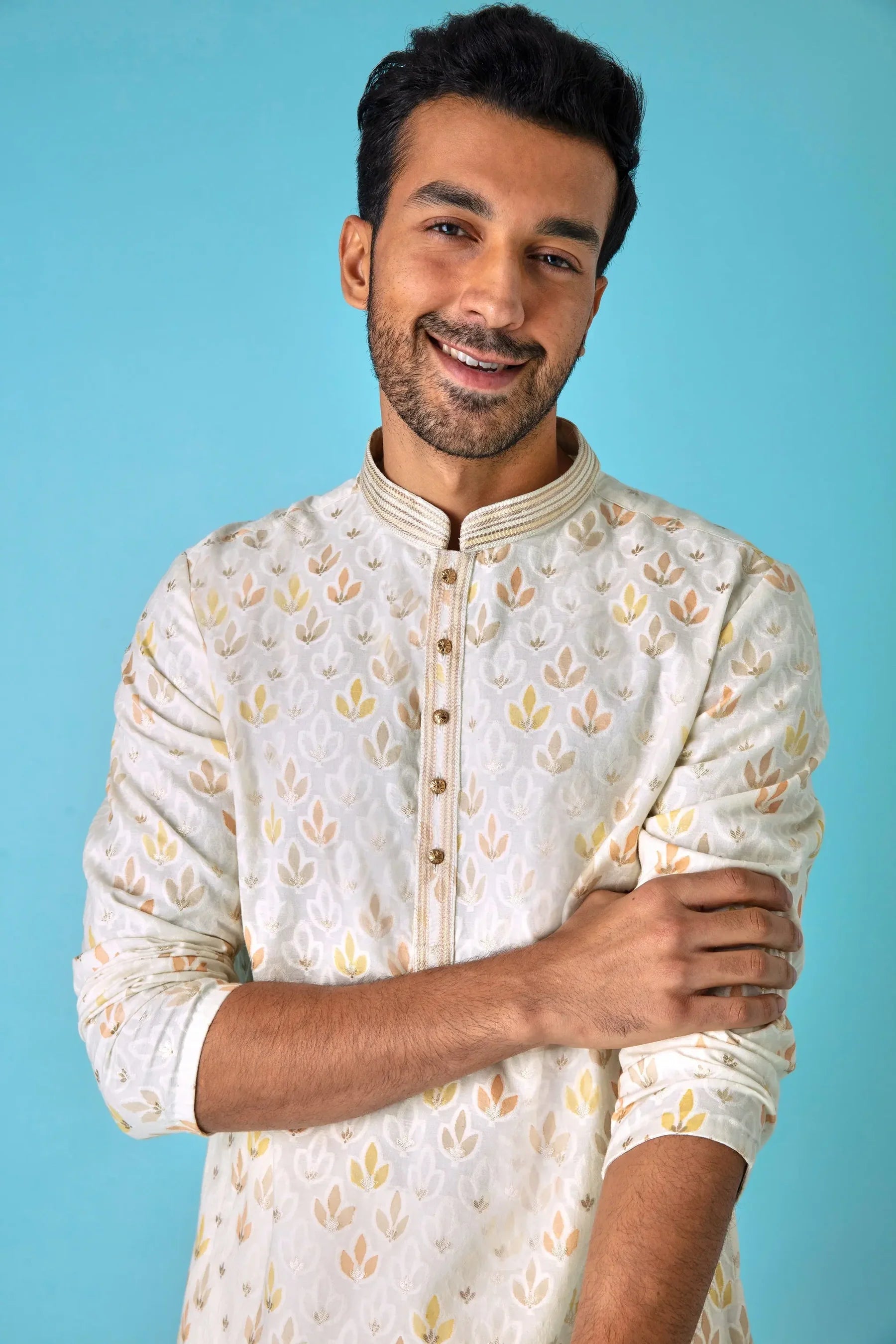 Leafy Affair: Ivory Kurta with Leaf Motifs in Yellow, Peach, and White