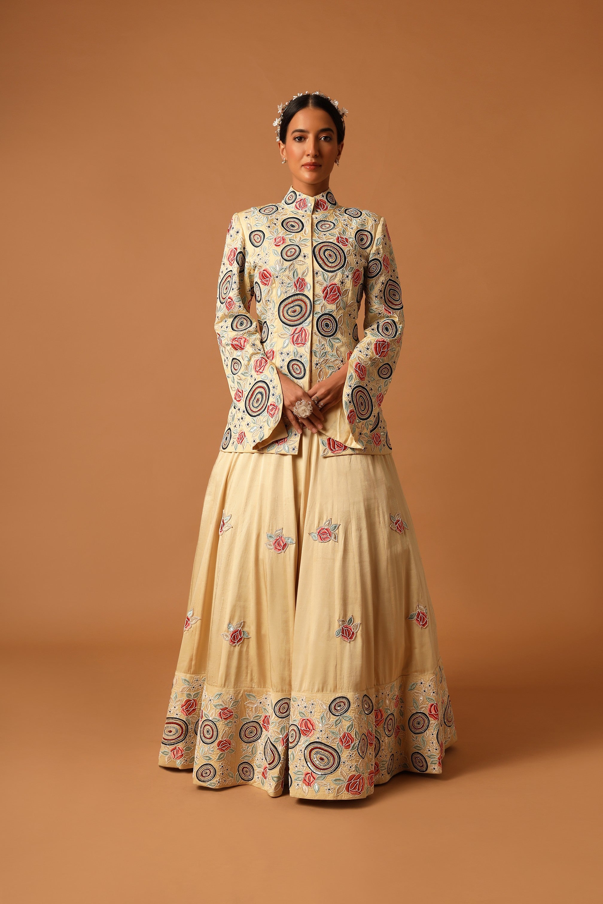 beige embroidered jacket with lehenga and dupatta