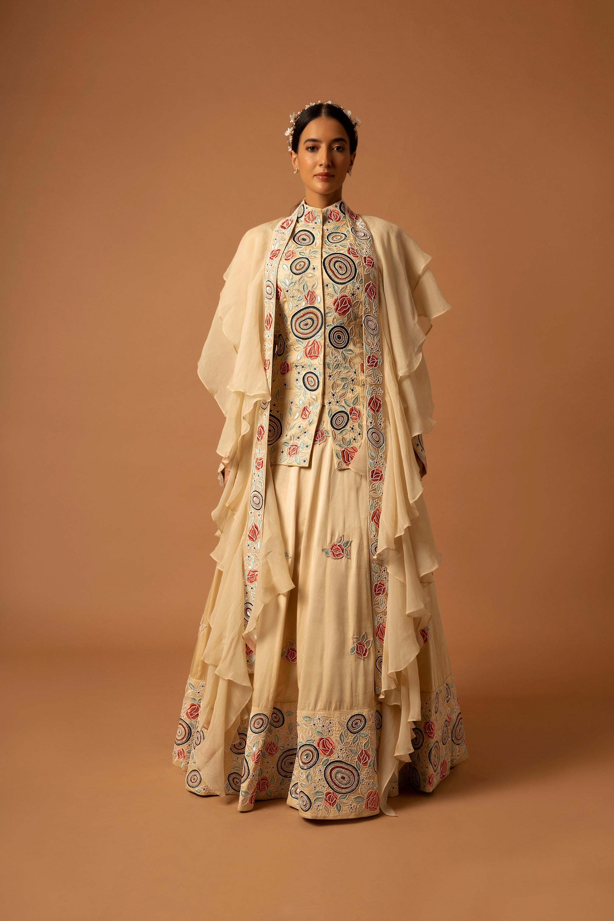beige embroidered jacket with lehenga and dupatta