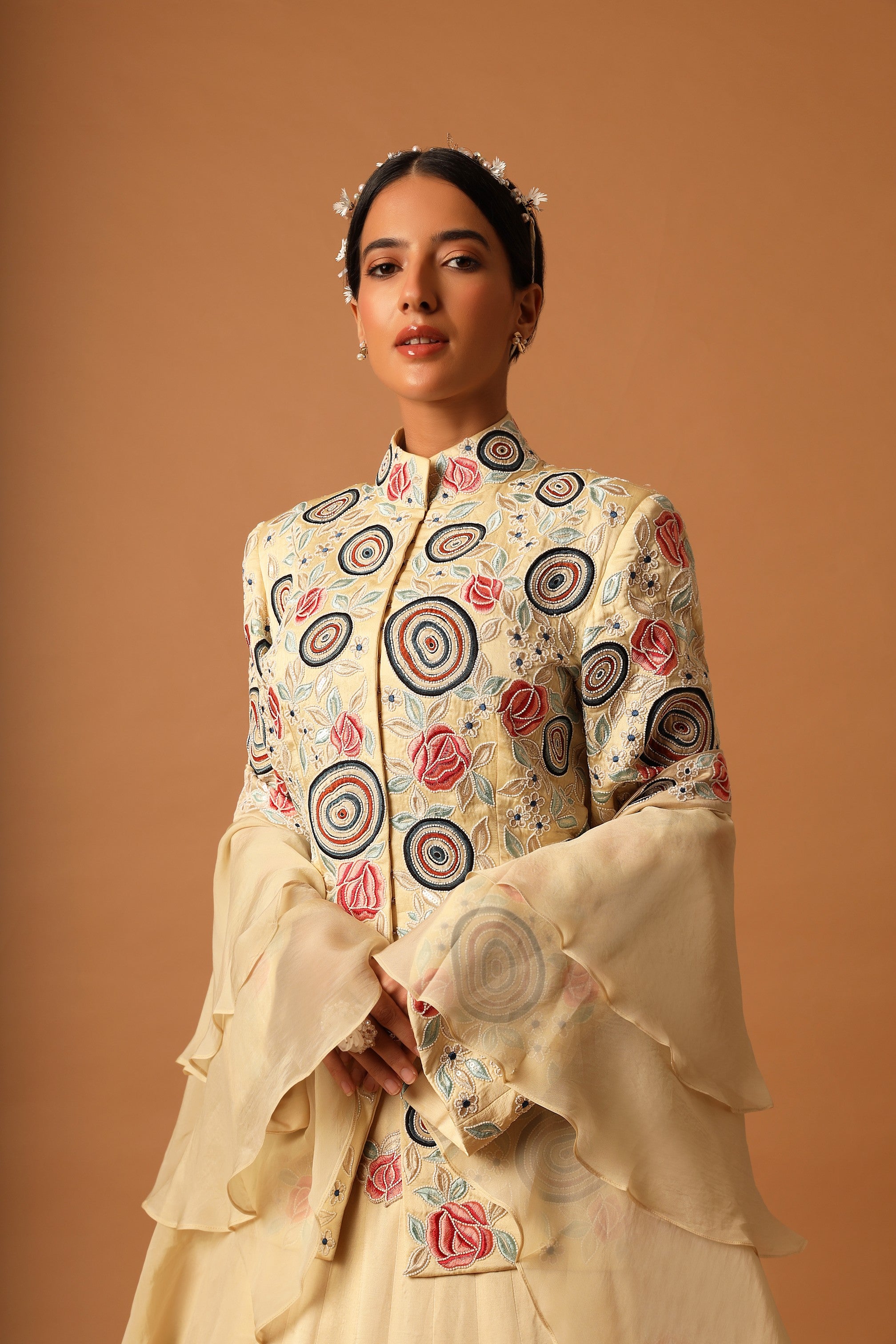 beige embroidered jacket with lehenga and dupatta