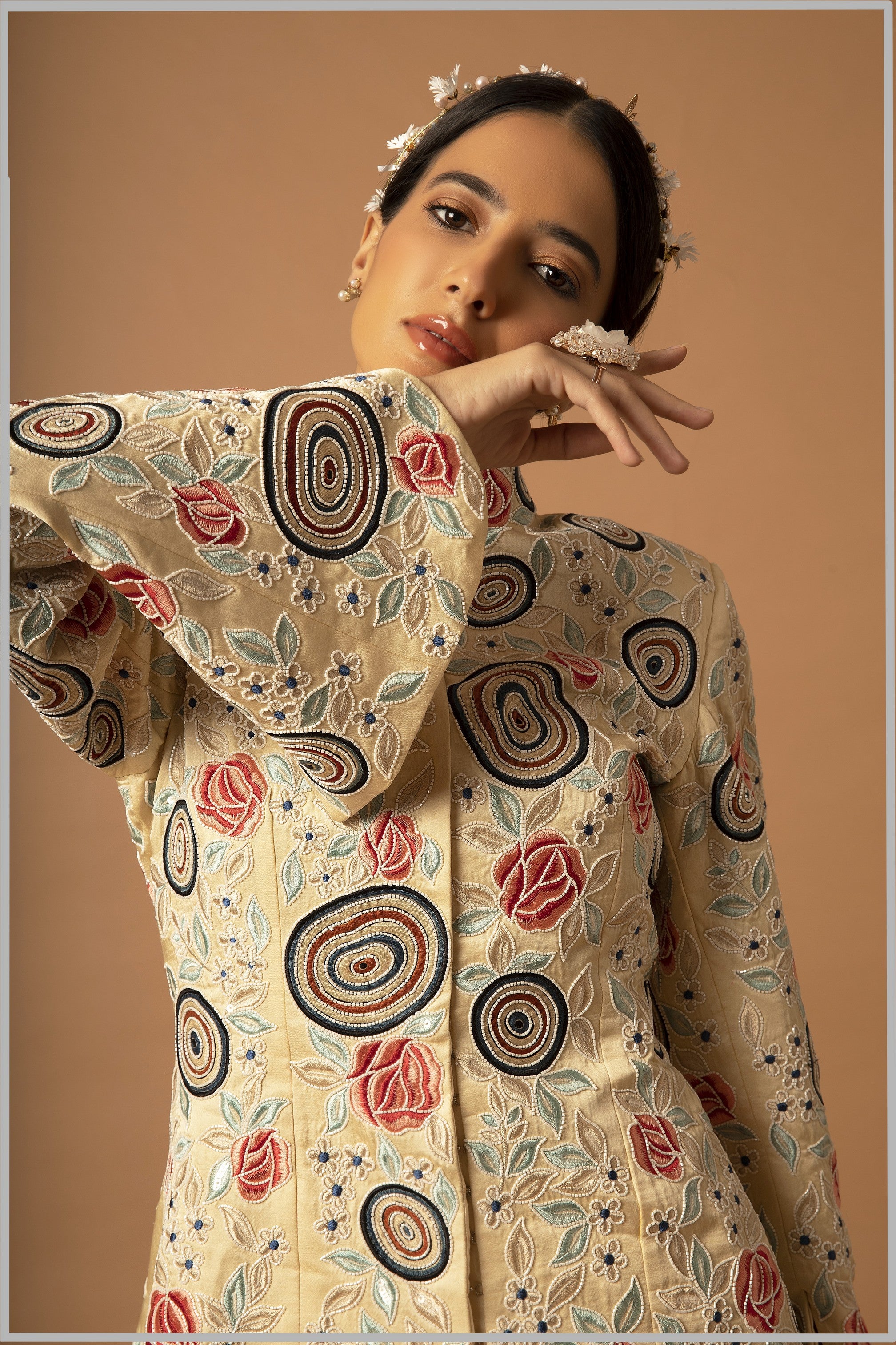 beige embroidered jacket with lehenga and dupatta